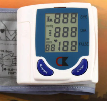 Wrist blood pressure monitor in use